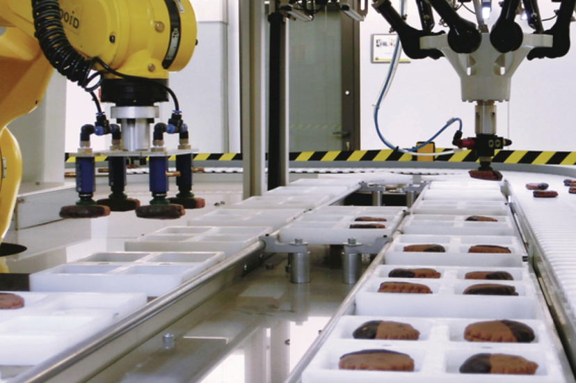 FANUC AI-powered robots on a packaging line