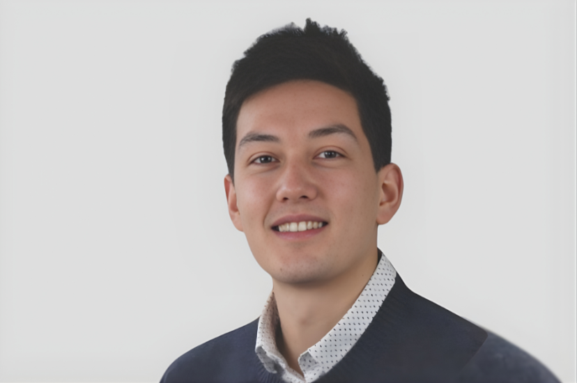 Alexandre Cottereau, Head of Product & Marketing at Effilux pictured in charcoal jacket and shirt collar against grey background. Machine vision lighting
