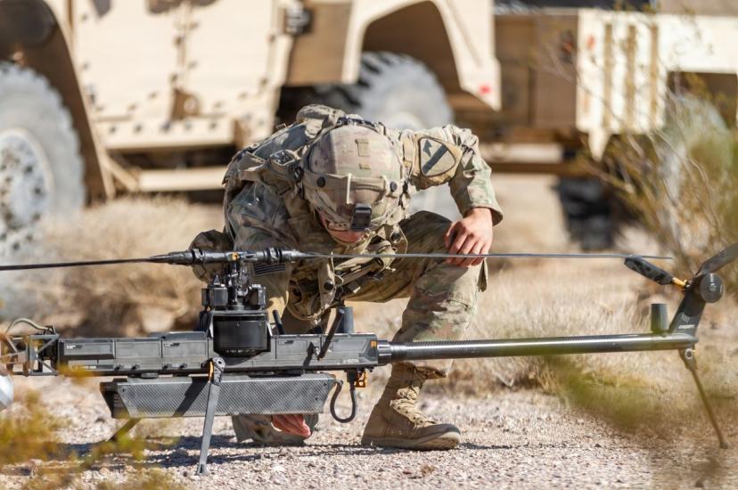 US Army unmanned aircraft system operator prepares an Anduril Ghost X for flight