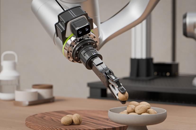 The wrist-mounted ZED X Nano camera, modelled by a robot arm