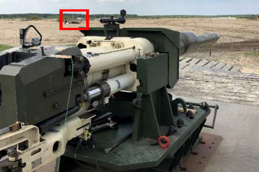 Smooth bore 120mm gun directed at a target with high-speed imaging tracker positioned in the red box out of the firing line
