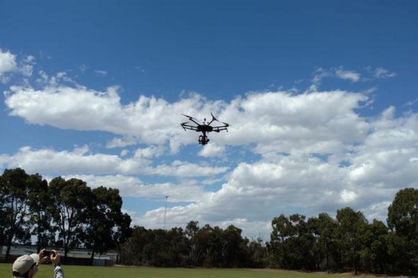 Drone test flight in a field