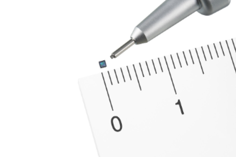 thin image sensor measures against a ruler and a pen