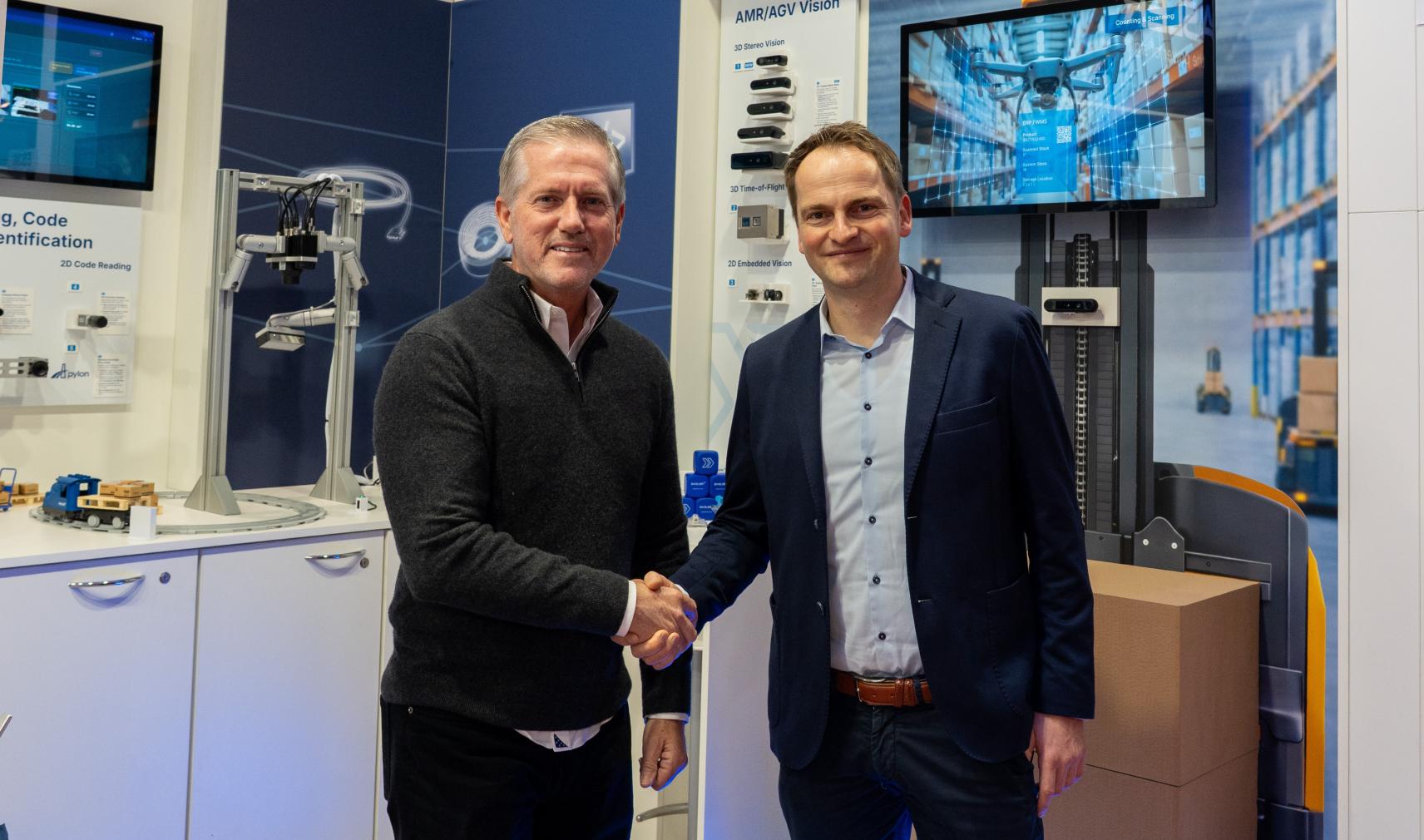 Mike McSweeney, Vice President of Sales at Orbbec, and René von Fintel, Executive Director Business Management at Basler announce partnership at LogiMAT 2026