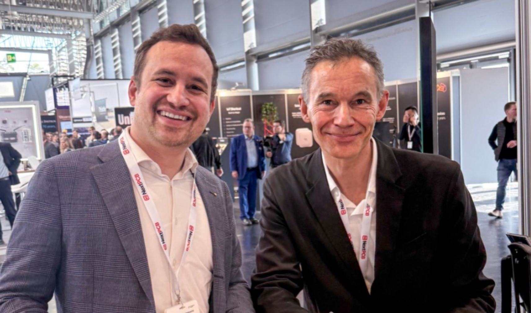 Jan Hartmann and Jean Ferré signing agreement at Embedded World 2026