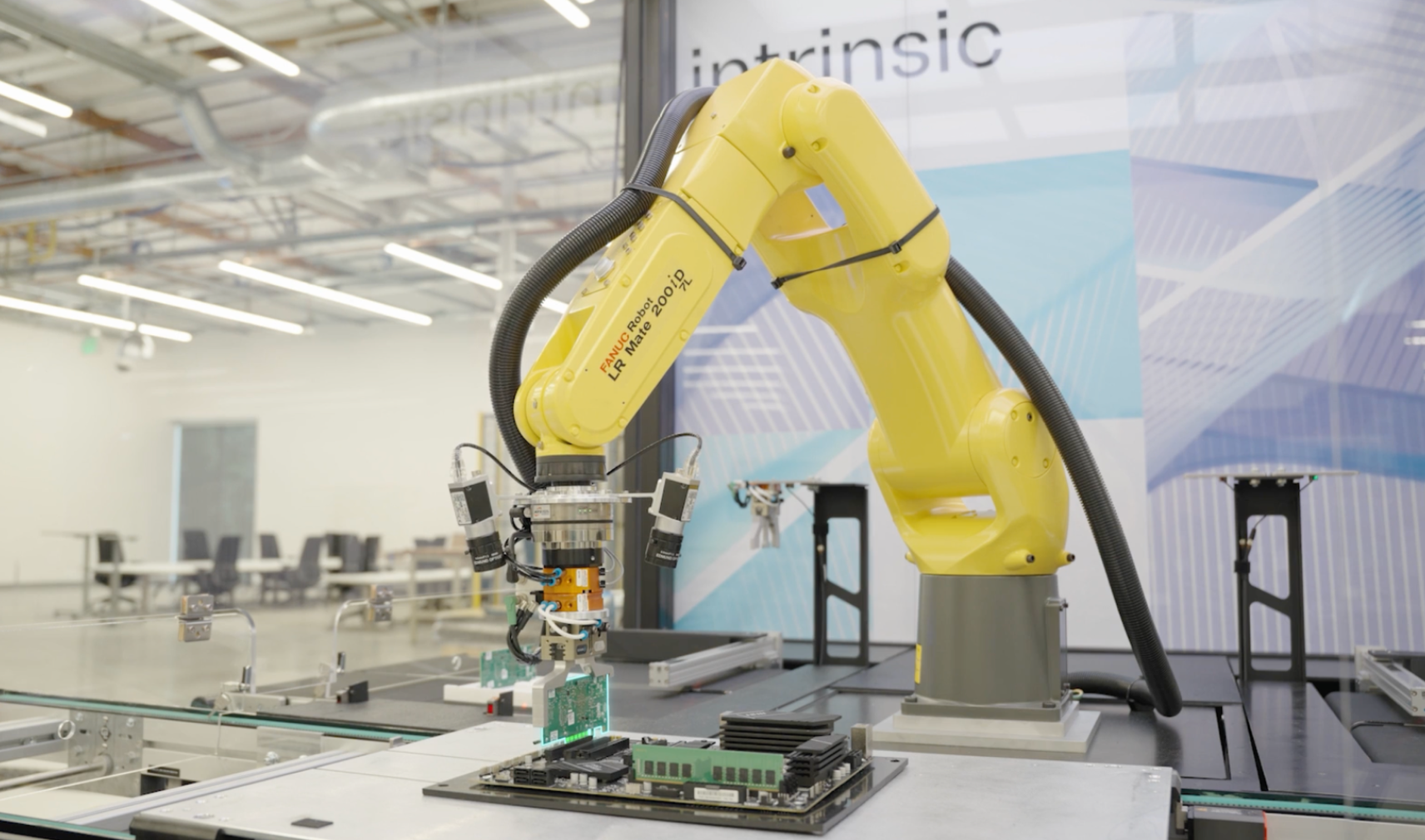 FANUC robot performing automated task at Automate 2026 exhibition