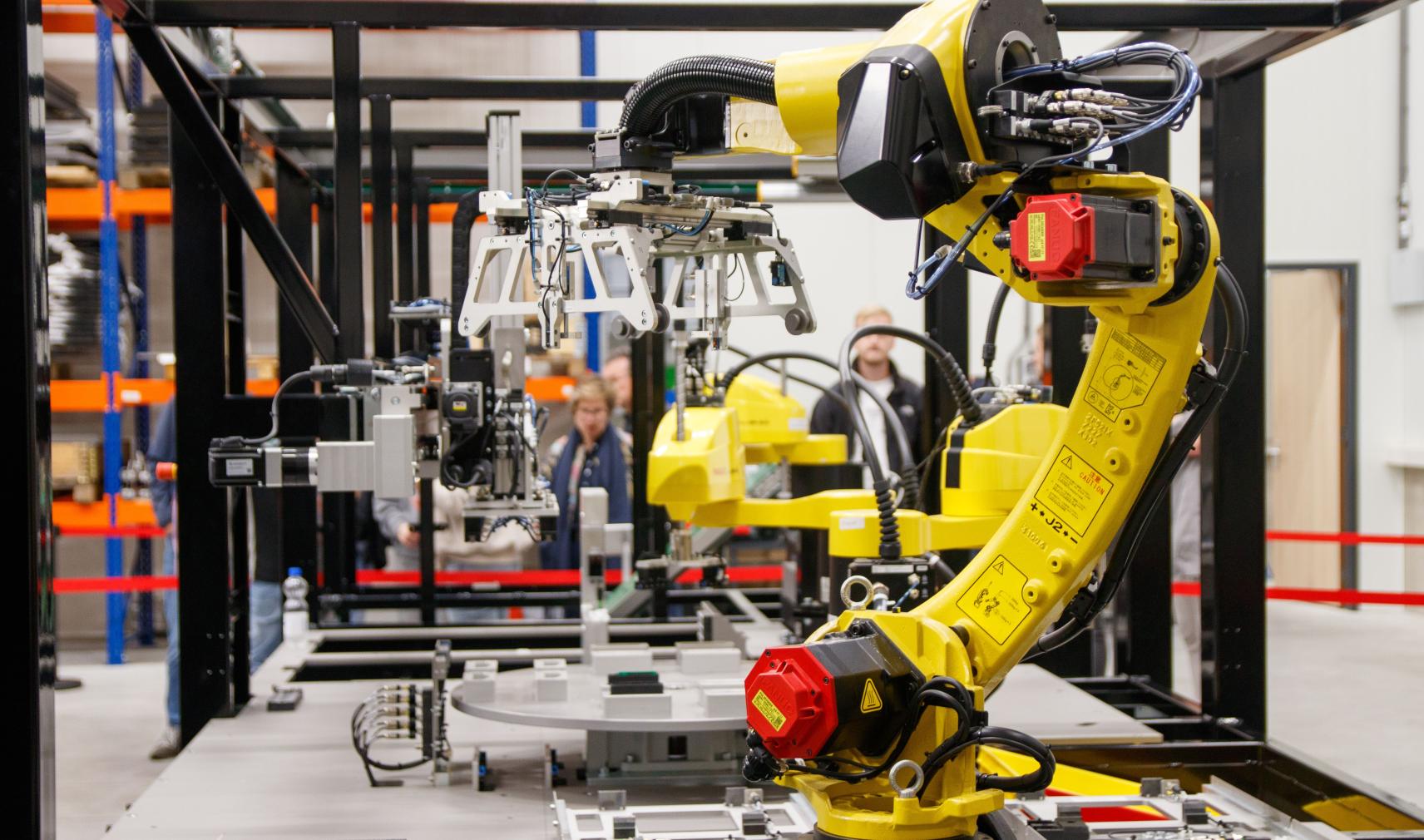 An industrial robot working on a production line