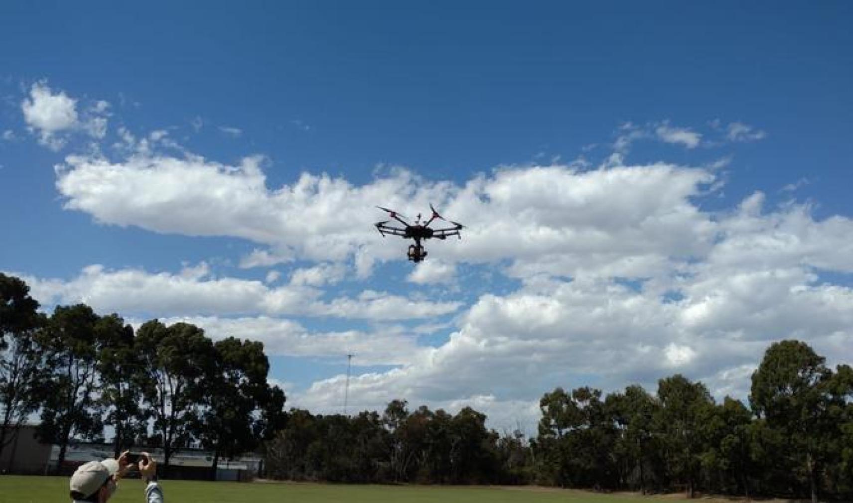 Drone test flight in a field