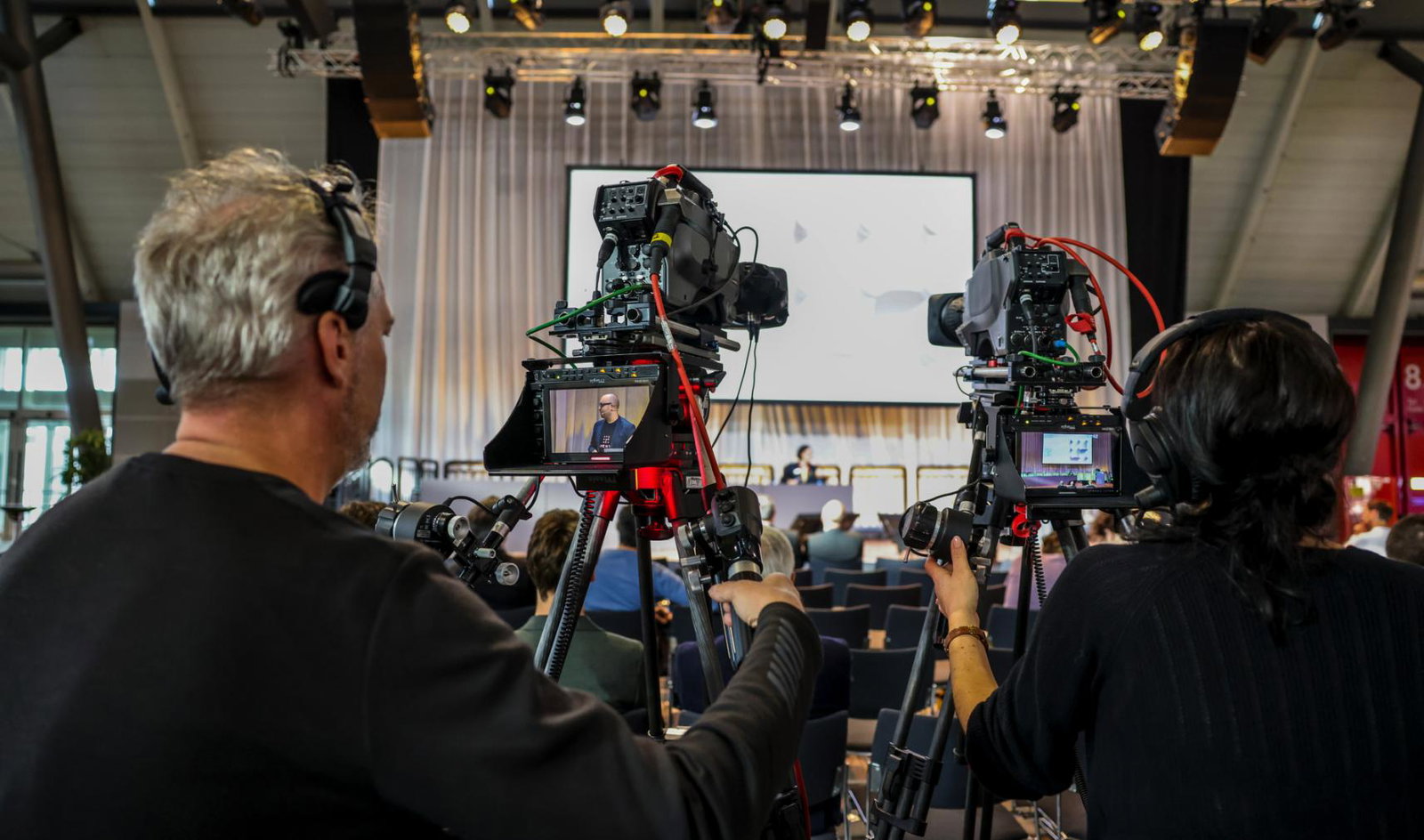 VISION 2024 Cameras recording a presentation