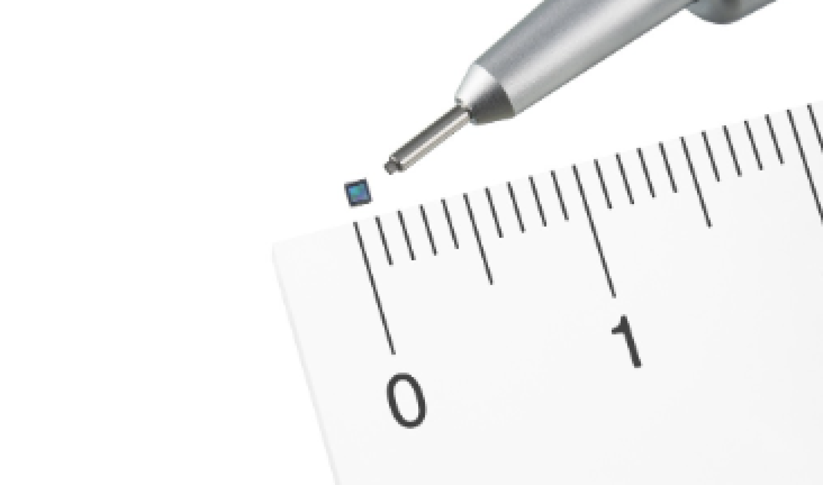 thin image sensor measures against a ruler and a pen