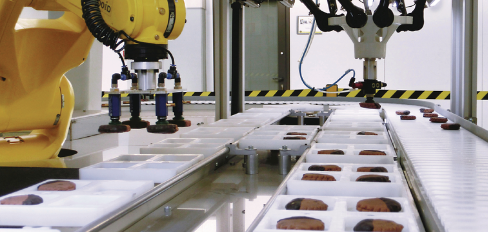 FANUC AI-powered robots on a packaging line