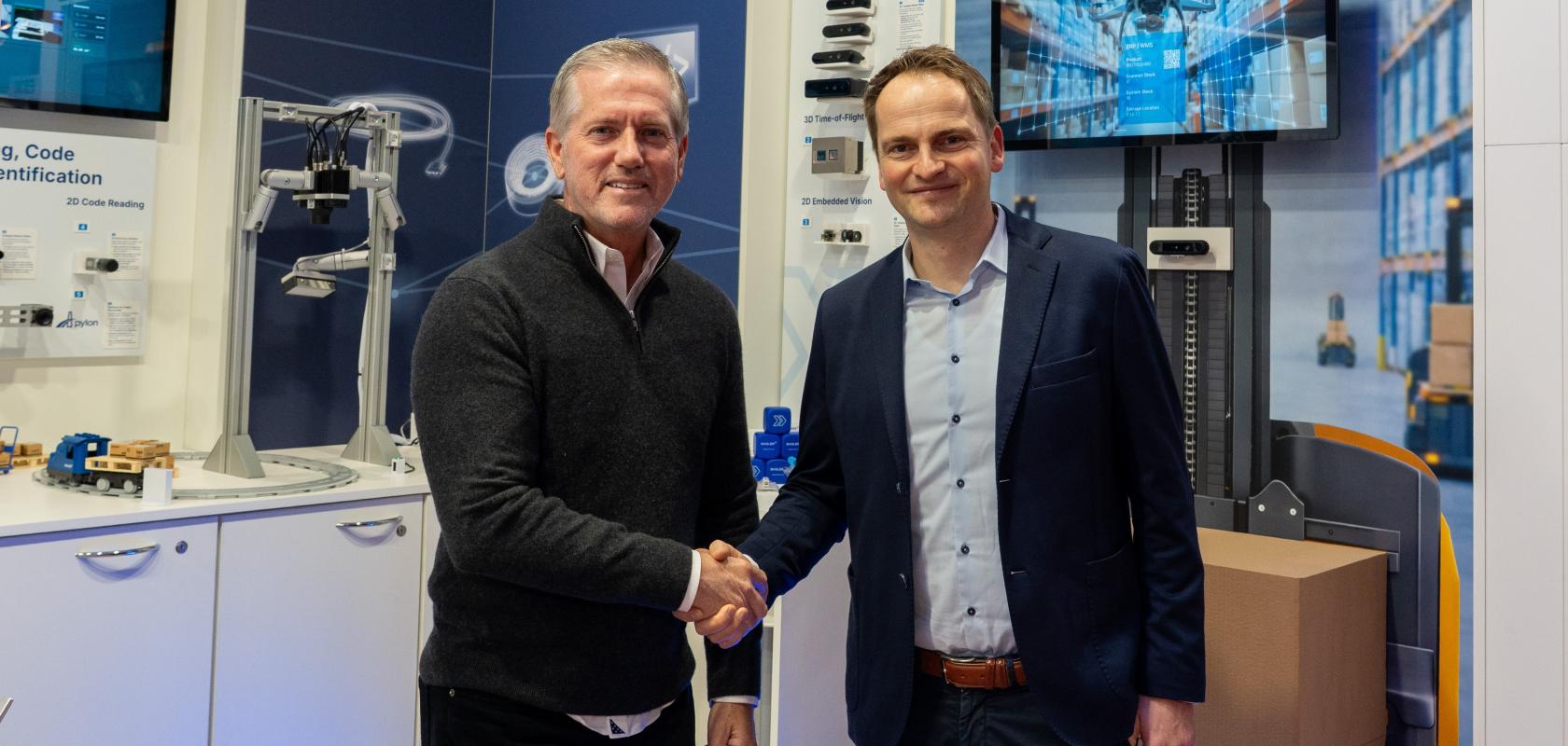 Mike McSweeney, Vice President of Sales at Orbbec, and René von Fintel, Executive Director Business Management at Basler announce partnership at LogiMAT 2026