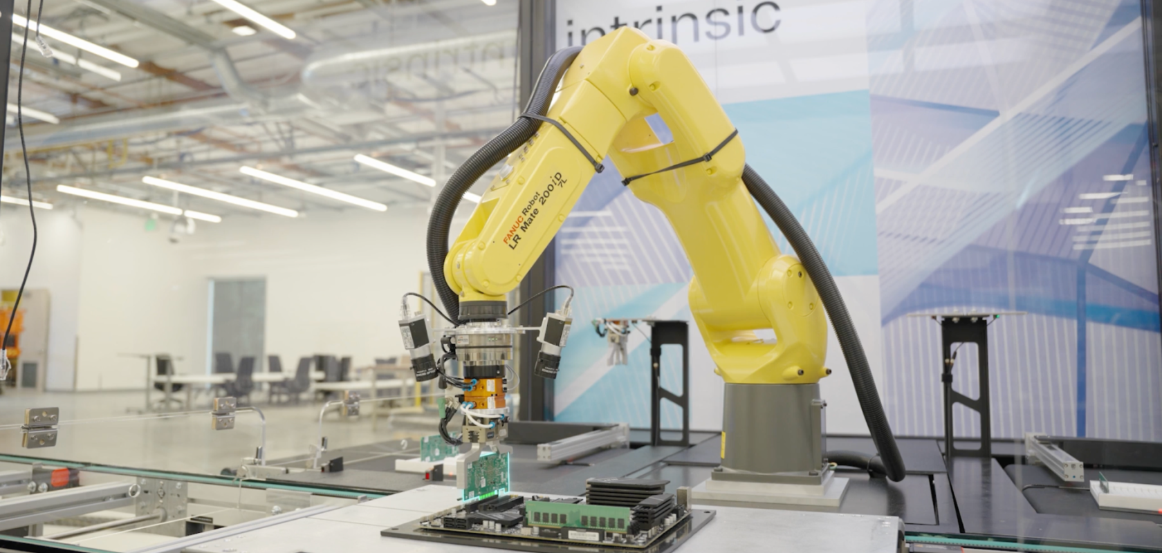 FANUC robot performing automated task at Automate 2026 exhibition