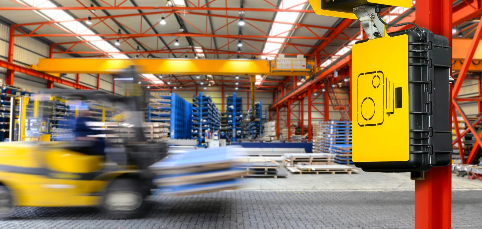 Forklift travelling quickly in logistics centre