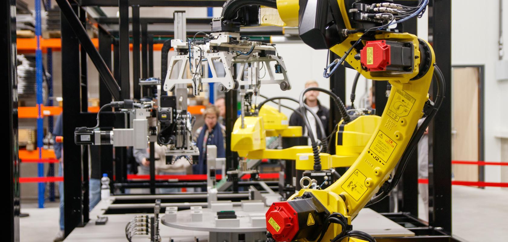An industrial robot working on a production line