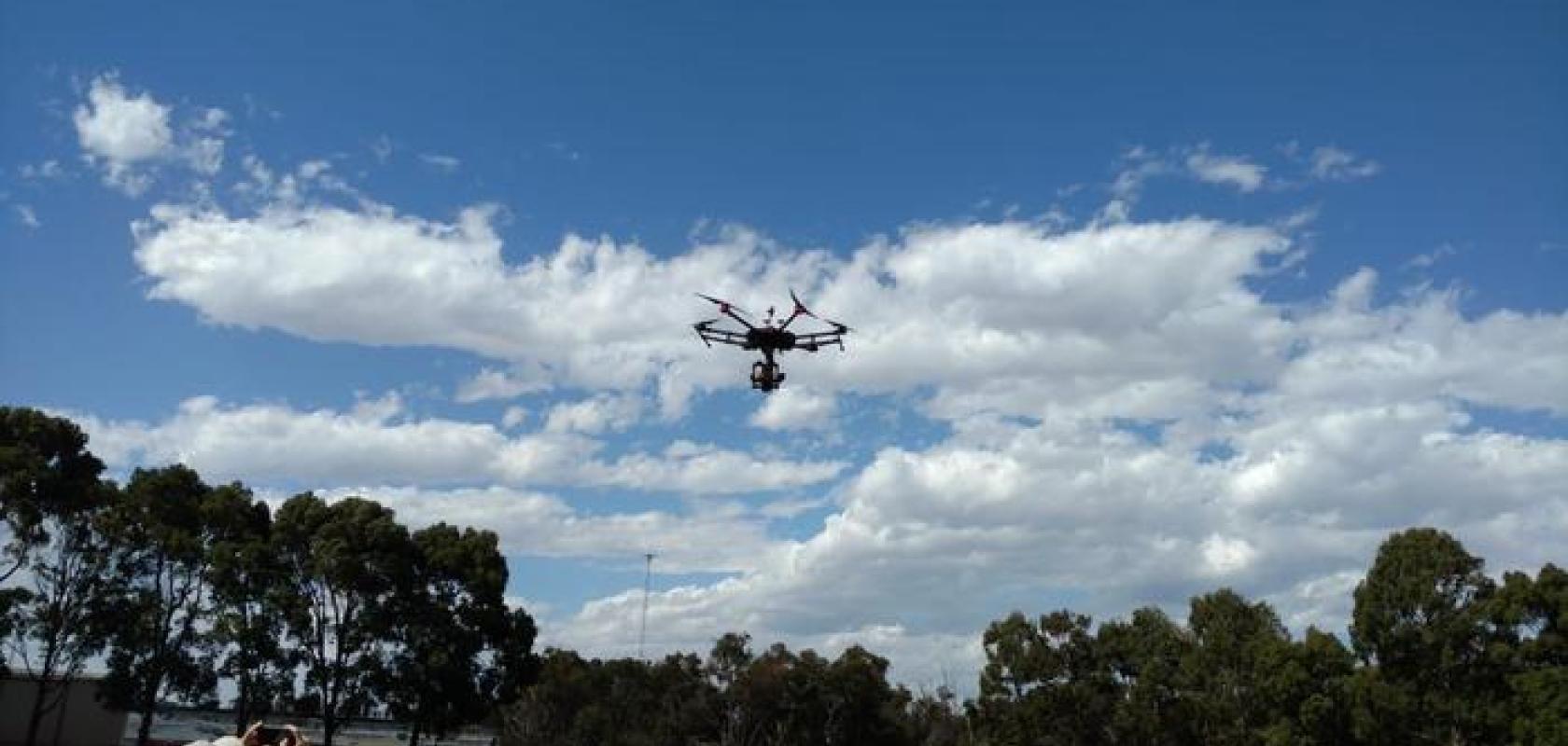 Drone test flight in a field