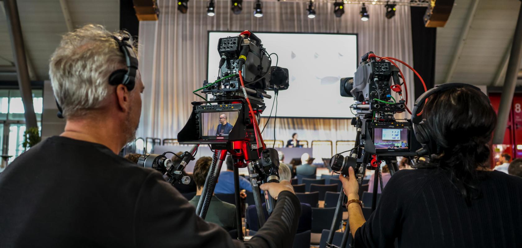 VISION 2024 Cameras recording a presentation