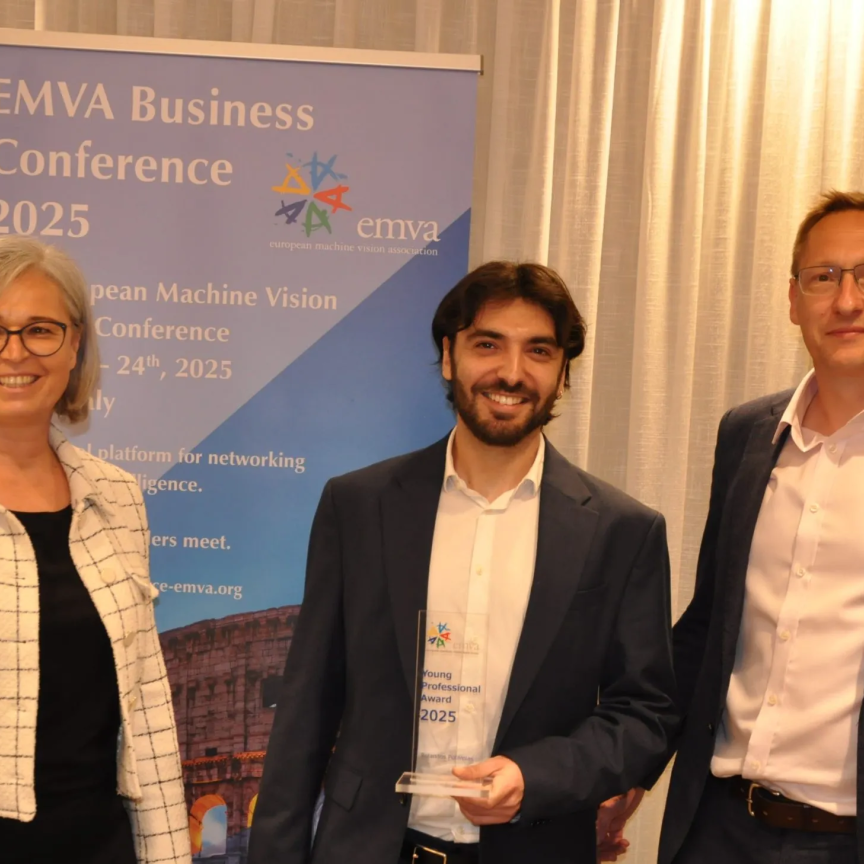 EMVA Board Member Petra Thanner and EMVA President Dr Chris Yates, right, present the EMVA Young Professional Award 2025 to Dr Rolandos Alexandros Potamias at teh 2025 EMVA Business Conference in Rome (Image: EMVA)