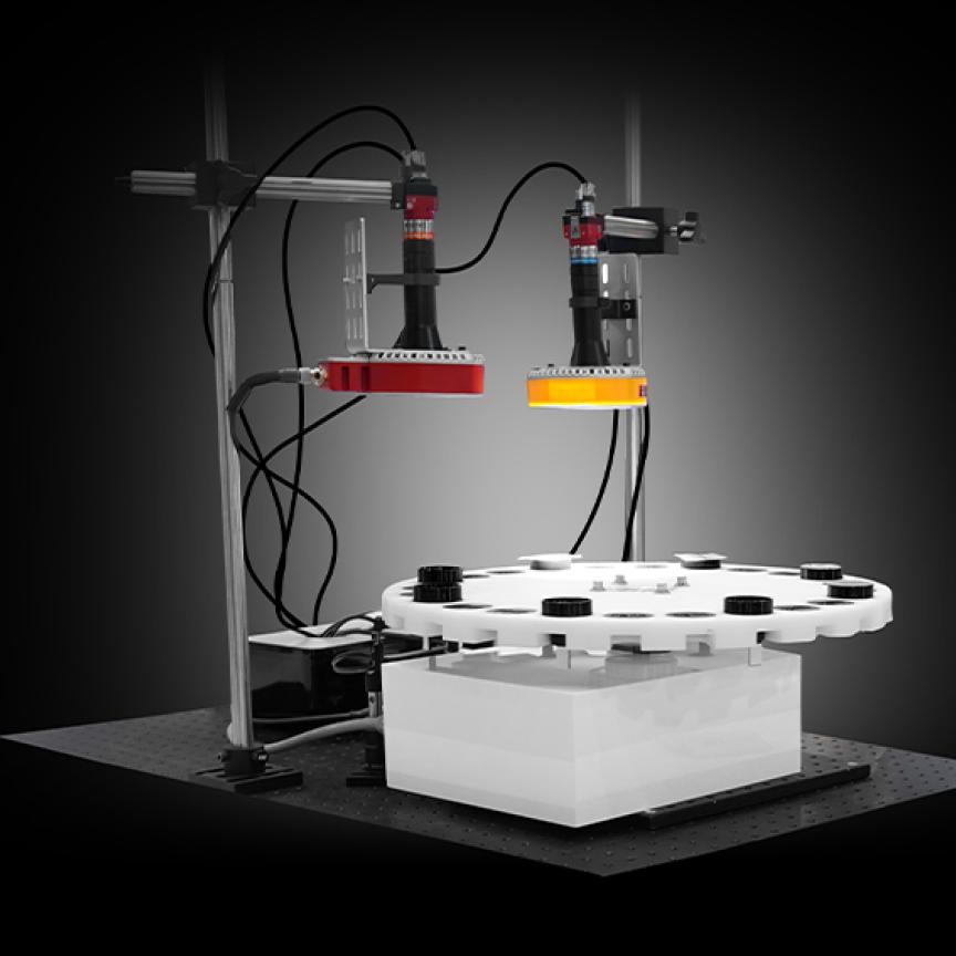 Optical measurement and testing setup with two machine vision cameras and a rotating sample stage