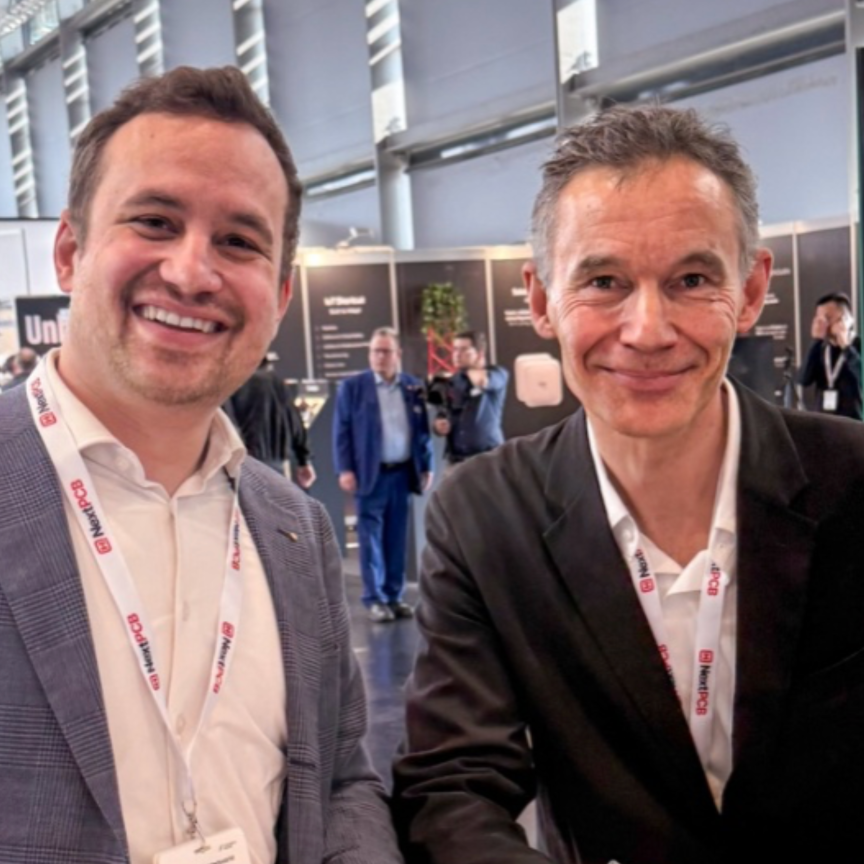 Jan Hartmann and Jean Ferré signing agreement at Embedded World 2026