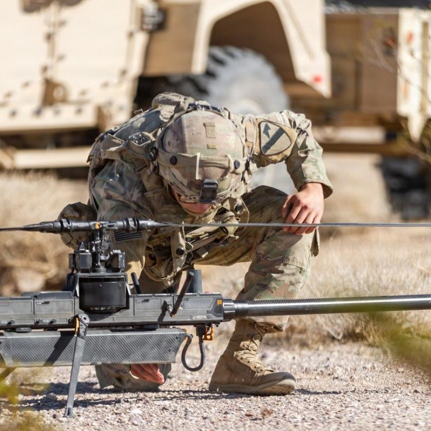 US Army unmanned aircraft system operator prepares an Anduril Ghost X for flight