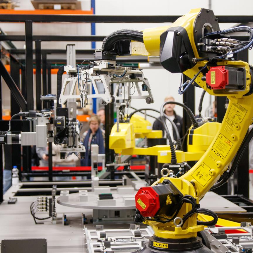 An industrial robot working on a production line