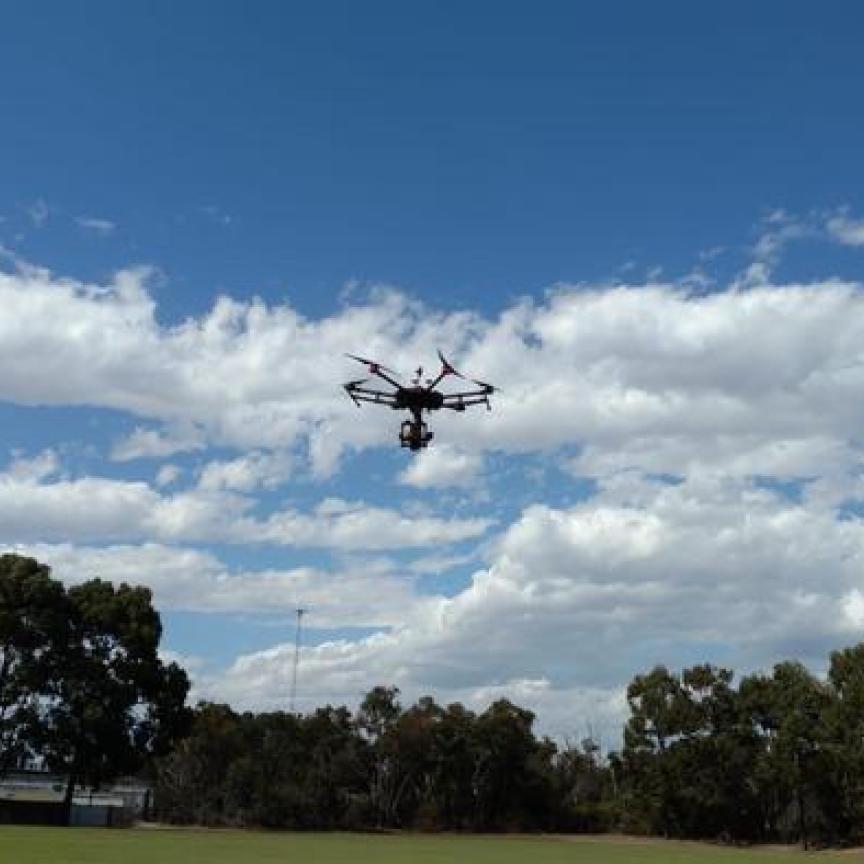 Drone test flight in a field