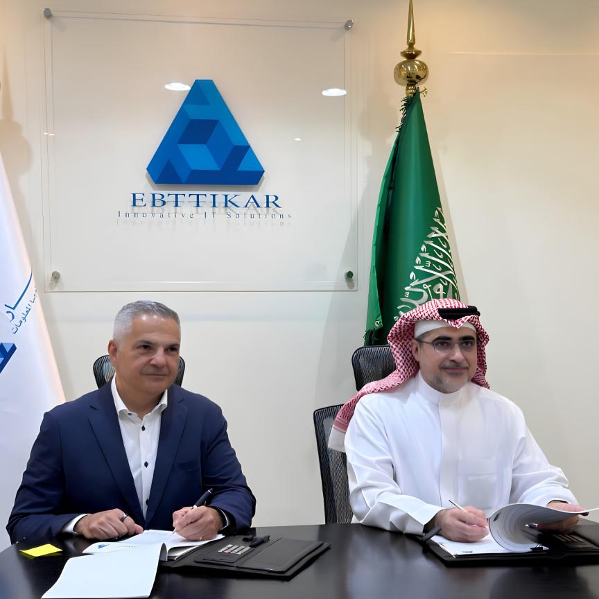 Ross Jatou and Rashid AlBallaa sign an agreement