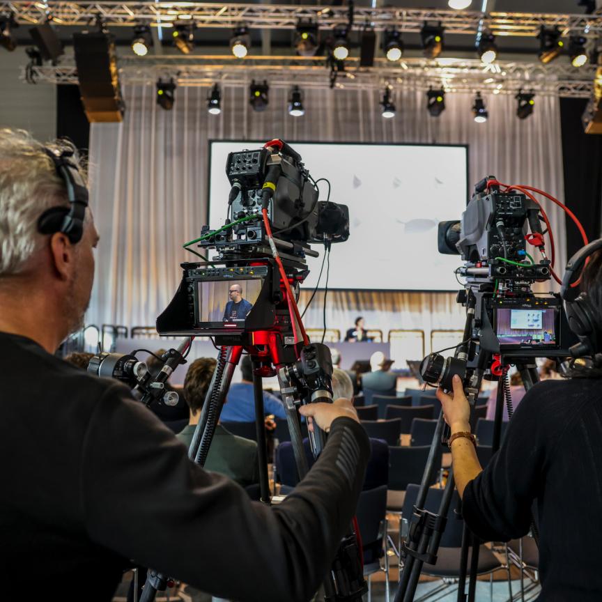 VISION 2024 Cameras recording a presentation