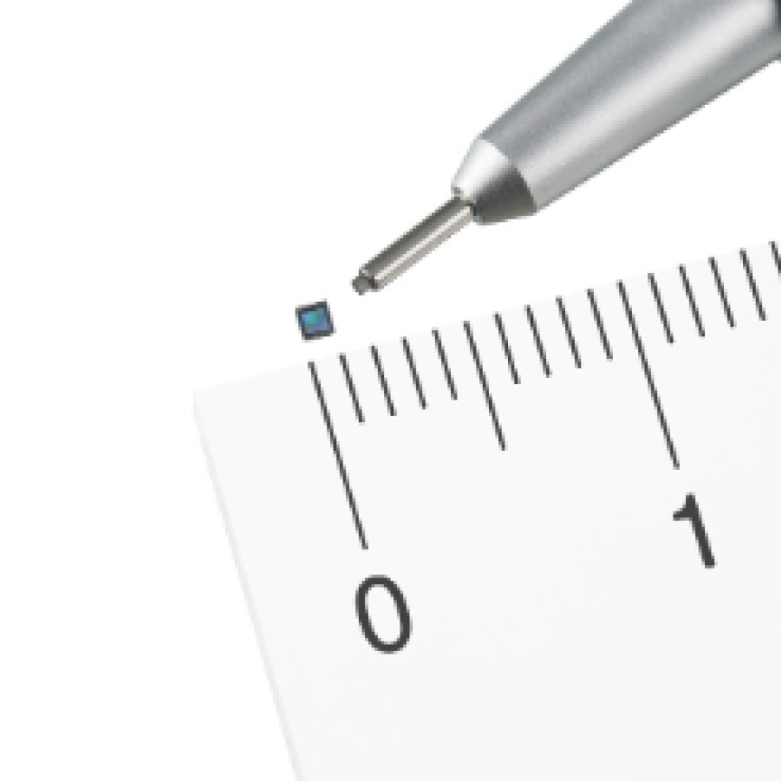 thin image sensor measures against a ruler and a pen