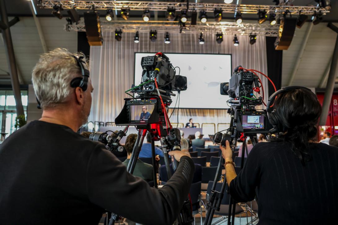VISION 2024 Cameras recording a presentation